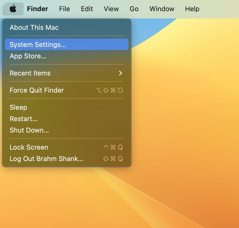 Clicking "System Settings" from Apple menu on Mac.