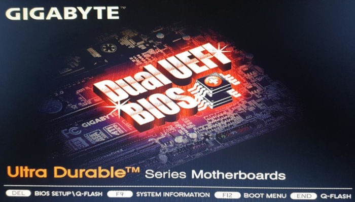 A photograph of a motherboard's BIOS splash screen.