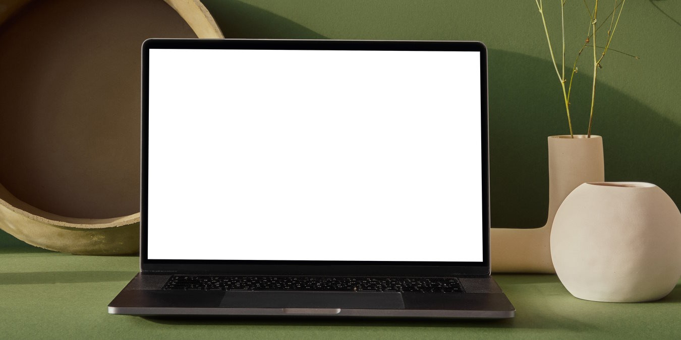 A laptop showing a blank screen.