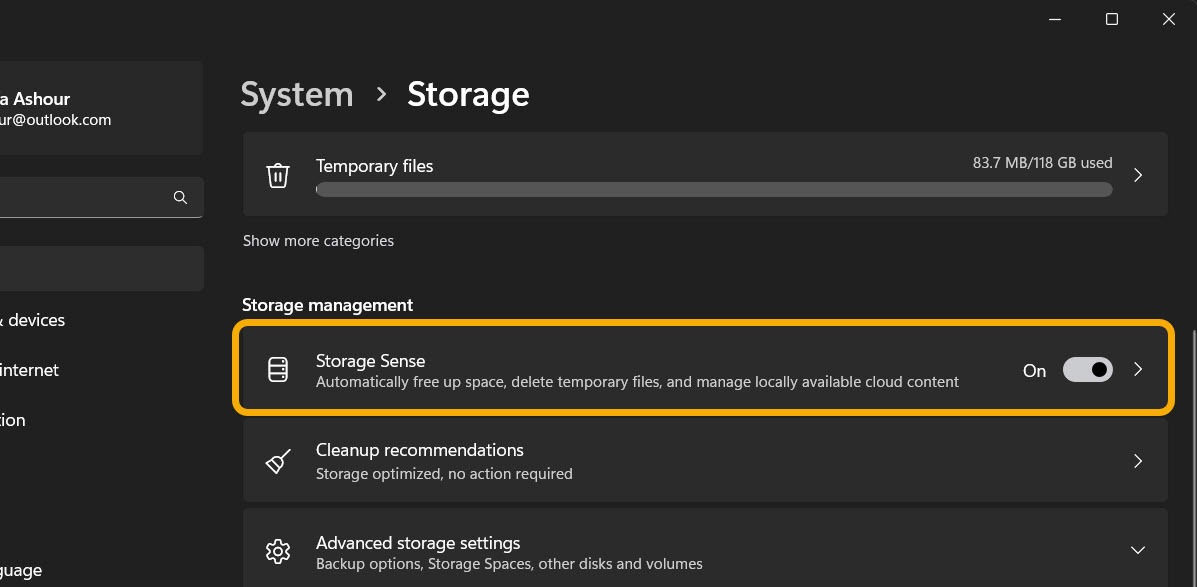 Enabling "Storage Sense" from Windows Settings.