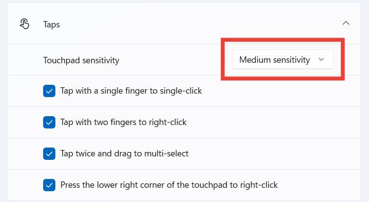 Windows 11 Touchpad settings, with the "Touchpad sensitivity" dropdown highlighted.
