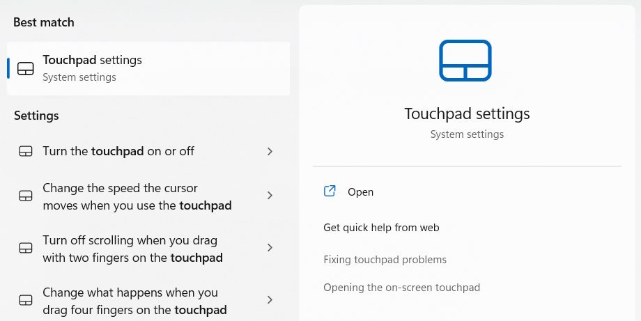 Windows Search showing "Touchpad Settings" is the search results.
