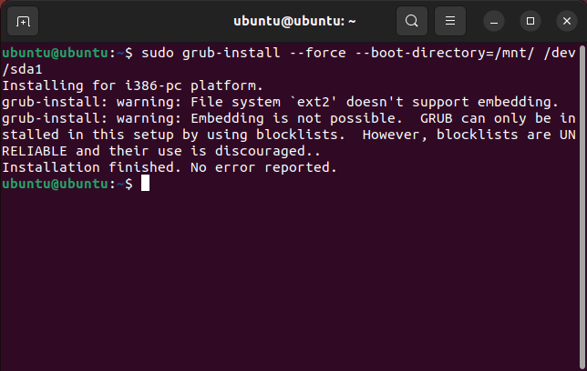 A window showing the GRUB reinstallation process for Ubuntu.