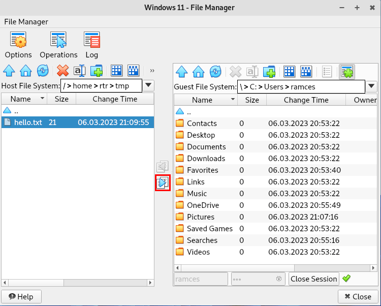 A screenshot showing the File Transfer button in the middle of the File Manager window.